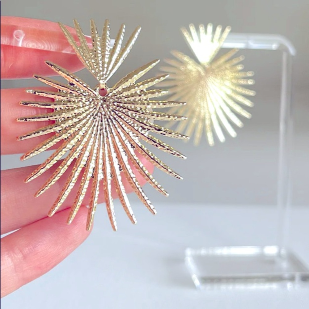 Gold celestial starburst earrings